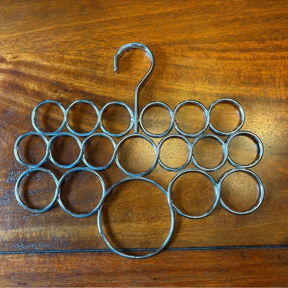 How To Tie A Scarf book with a beautiful scarf and a scarf hanger. - Picture 7 of 11